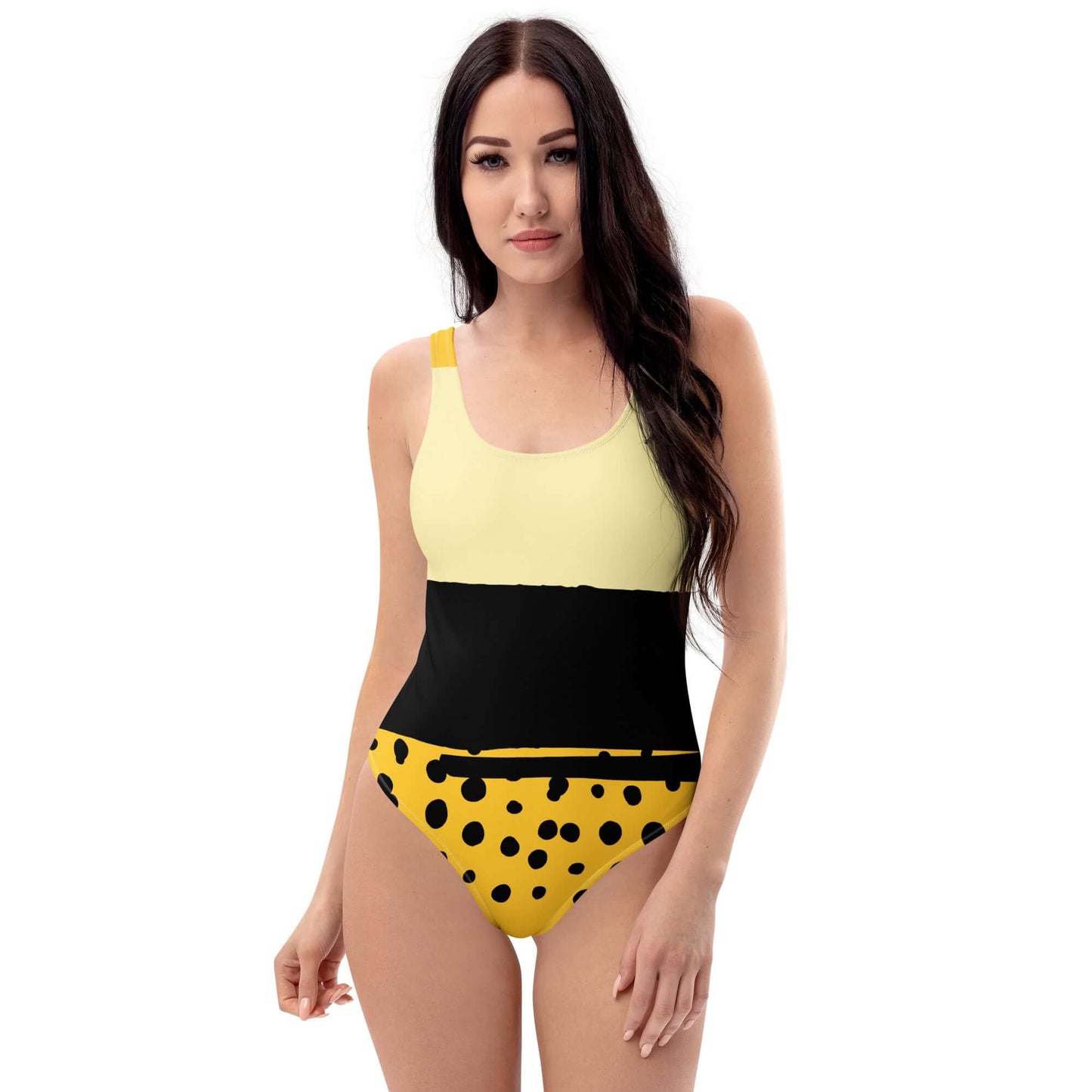Costume da bagno intero elegante in giallo e nero con design a pois, ideale per la moda mare 2025.